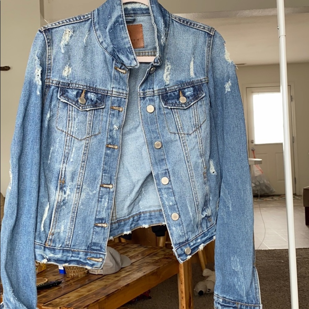 Adorable distressed jean jacket